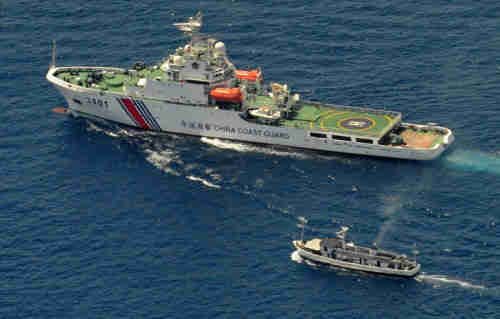 Philippine troop and Chinese maritime police boat confrontation at Second Thomas Reef.