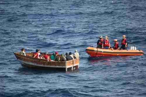 Coast Guard approaches a Cuban vessel with 12 migrants on December 30.  The migrants were later repatriated to Cuba