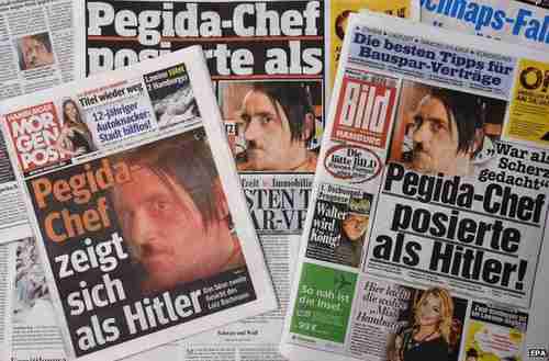 German newspapers carrying the photo of Pegida leader Lutz Bachmann posing as Hitler (BBC)