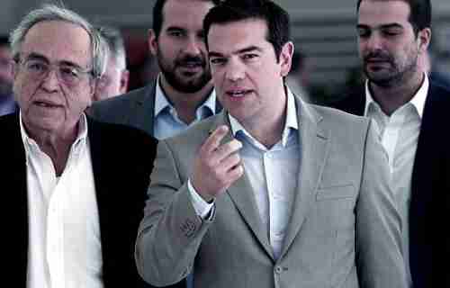 Prime Minister Alexis Tsipras (center) speaks with Minister of Culture Aristides Baltas (L) in Athens (Kathimerini)