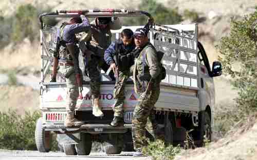 Syrian Turkmen fighters near border with Turkey last week (Reuters)