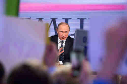 Putin at his tv call-in marathon on Thursday (AP)