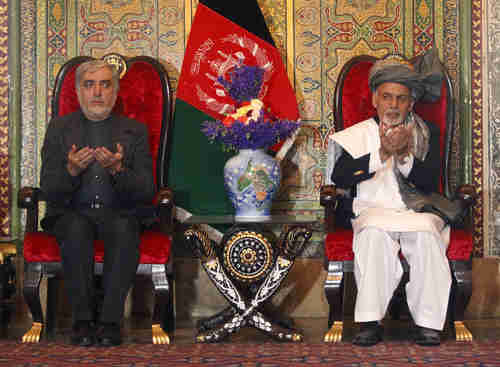 Unity government leaders President Ashraf Ghani, right, and Chief Executive Abdullah Abdullah (Reuters)