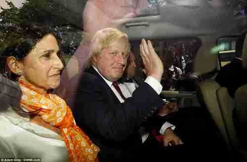 Boris Johnson, next to his wife Marina, waves goodbye on Thursday after standing down (Daily Mail)