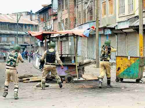 Anti-Indian protesters clashing with Indian police in Srinagar in Kashmir