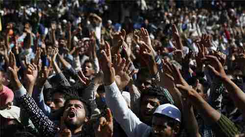 Muslims in India-controlled Kashmir shout pro-freedom slogans at funeral of 11-year-old boy on Saturday (EPA)