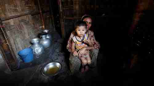 A Rohingya woman and child in a refugee camp in Bangladesh (Reuters)