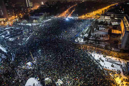Around 150,000 people protested in Romania's capital city Bucharest on Wednesday (Al Jazeera)